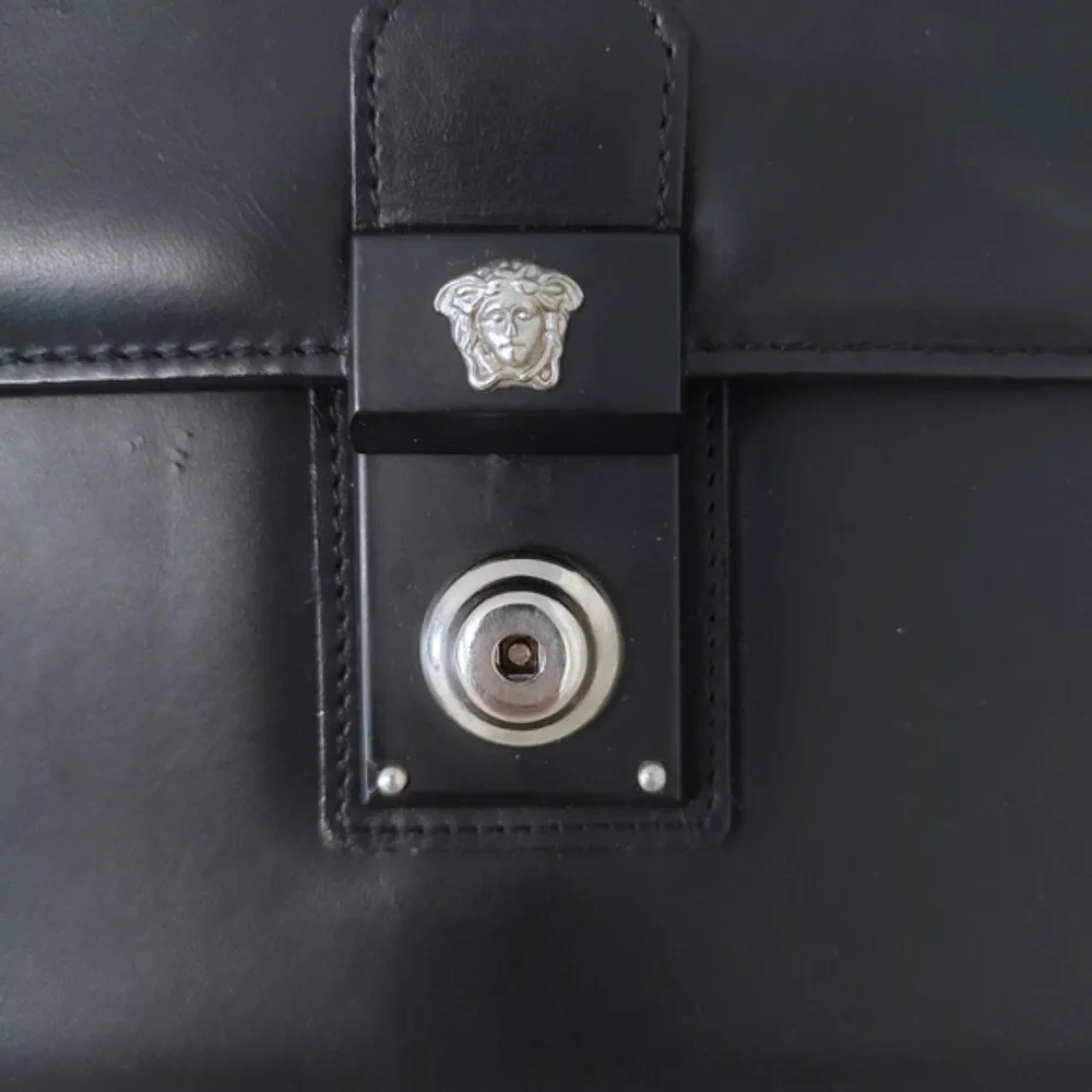 Gianni Versace vintage leather clutch silvertone hardware EUC